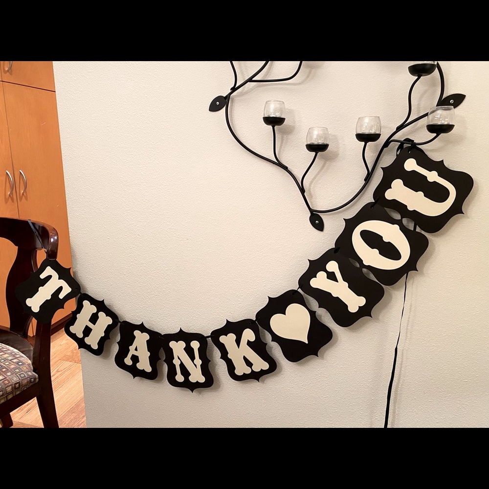 “THANK 🖤 YOU” sign
